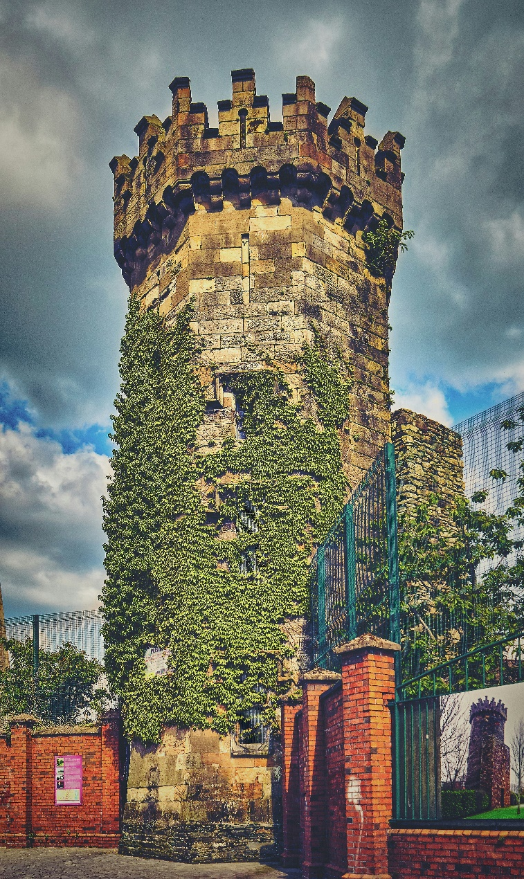 Historic brown brick wall and tower in Derry, Northern Ireland.
