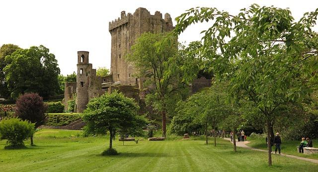 A breathtaking view of a castle stone walls and towers.