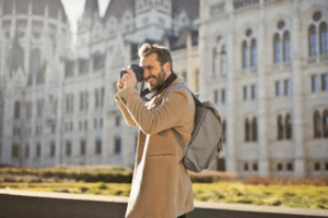 An image of a man photographing tourist sites