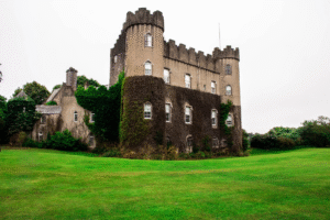 concrete castle with green grass around it
