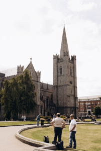 This photo shows a local historian speaking outside an old Irish church.