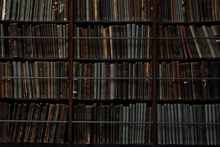 Vintage books on old library shelves
