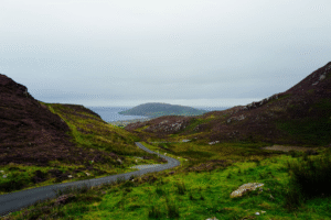 Beautiful winding road through verdant Irish highlands