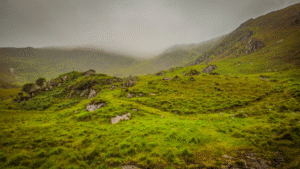 Tranquil misty landscape in Kilgarvan Ireland with hills